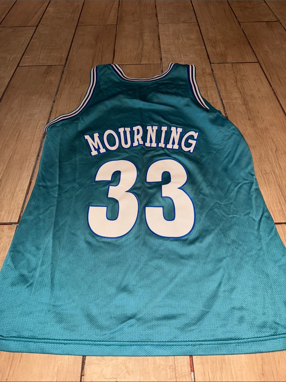 Champion Teal Mourning #33 Basketball Jersey